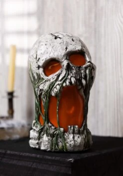 Light Up Flaming Rotted Skull 12 Inch Prop -Halloween Decoration Store 12 inch flaming rotted skull animated prop alt 1