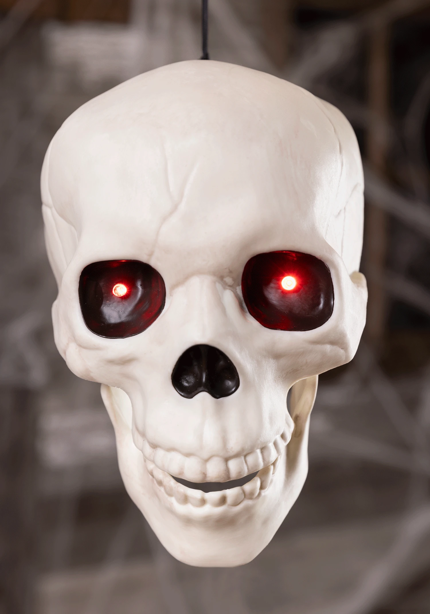 Life Sized Animated Hanging Skull Halloween Decoration 1 Life Sized Animated Hanging Skull Halloween Decoration