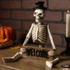 17-Inch Resin Skeleton Man Shelf Sitter With Welcome Sign Decoration